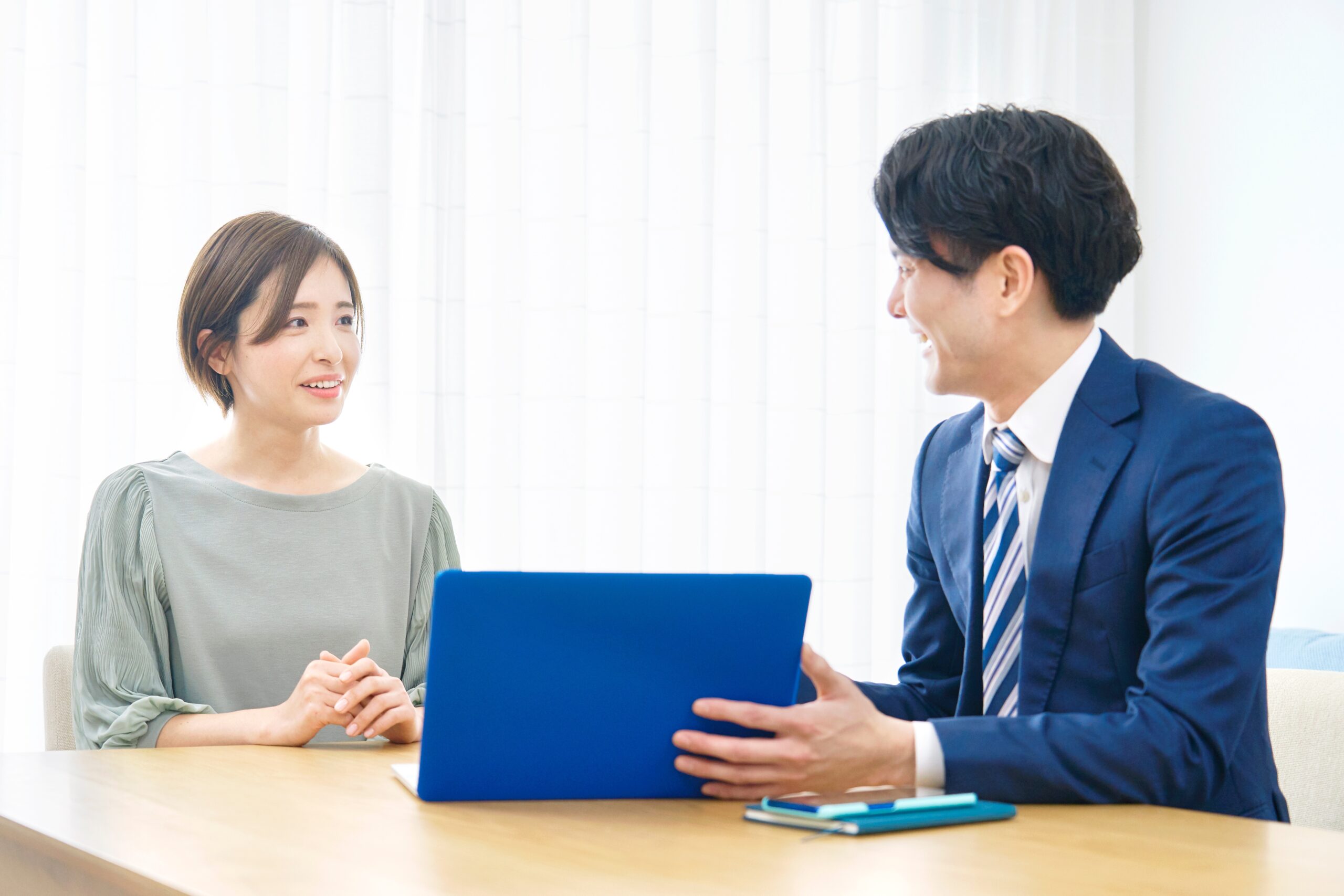 A salesman direct selling his product to a customer.